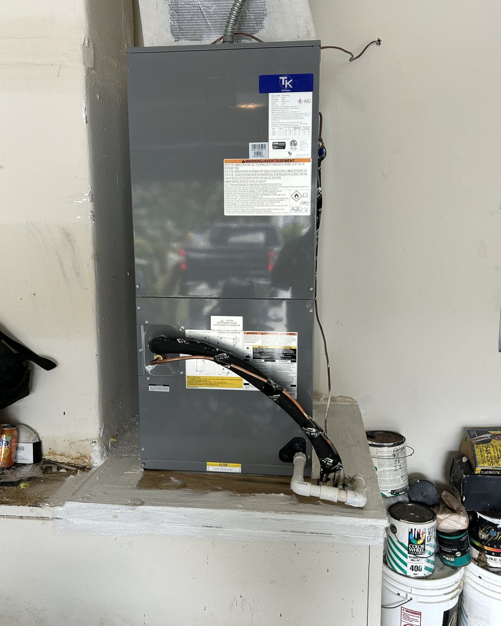 Newly installed air handler in a utility closet